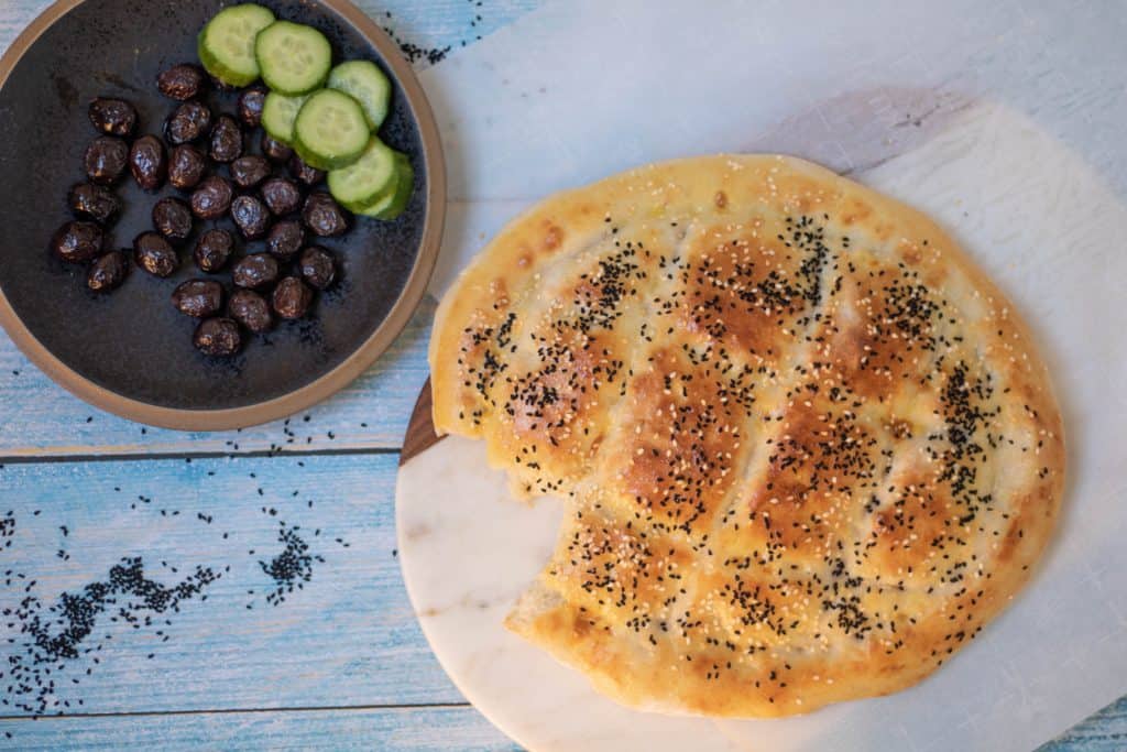 This easy-to-make Ramadan Bread is made by Turks, usually during the month of Ramadan for Iftar. You can easily knead the dough without a mixer or a special dough machine. The list of ingredients in this dough recipe can be found in any home.