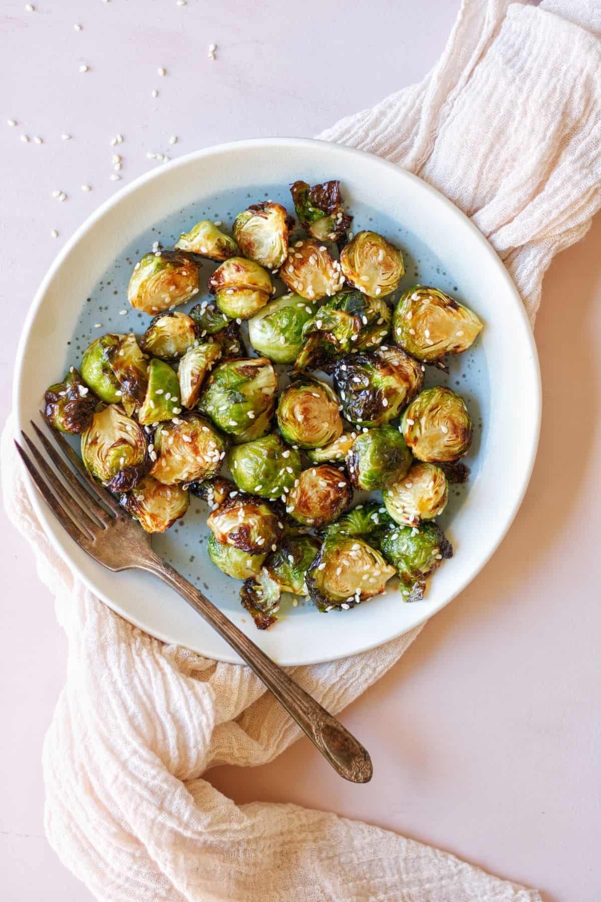 These golden brown and caramelized Brussel Sprouts are crispy, juicy, and bursting with flavor.