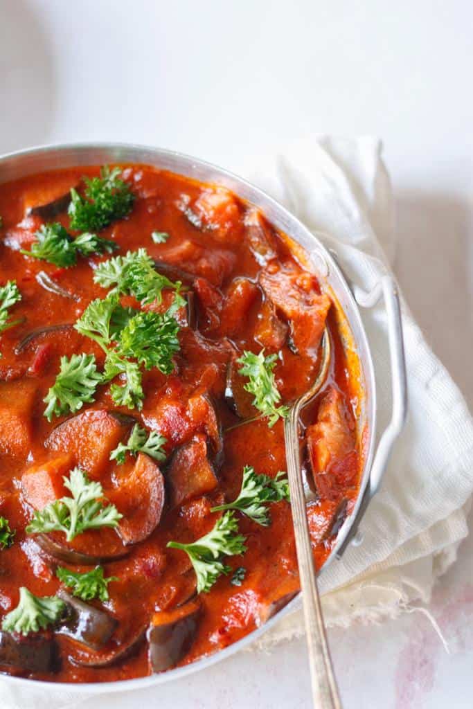 This vegan stew is packed with the lovely Mediterranean flavors. The tender eggplant simmered in tomato sauce make the perfect stew.