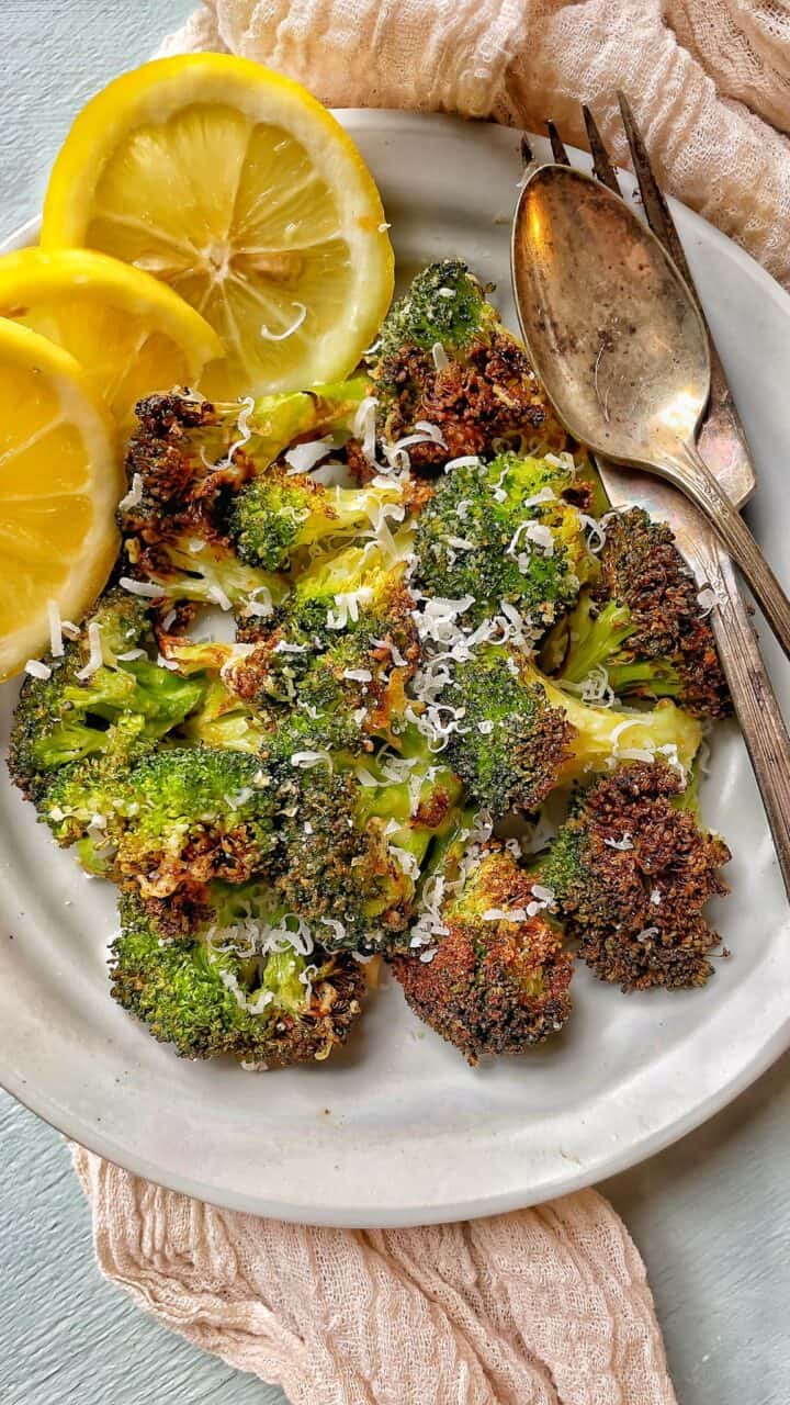 crispy air fryer broccoli with savory mixture of Fresh Broccoli, spices, and Parmesan Cheese