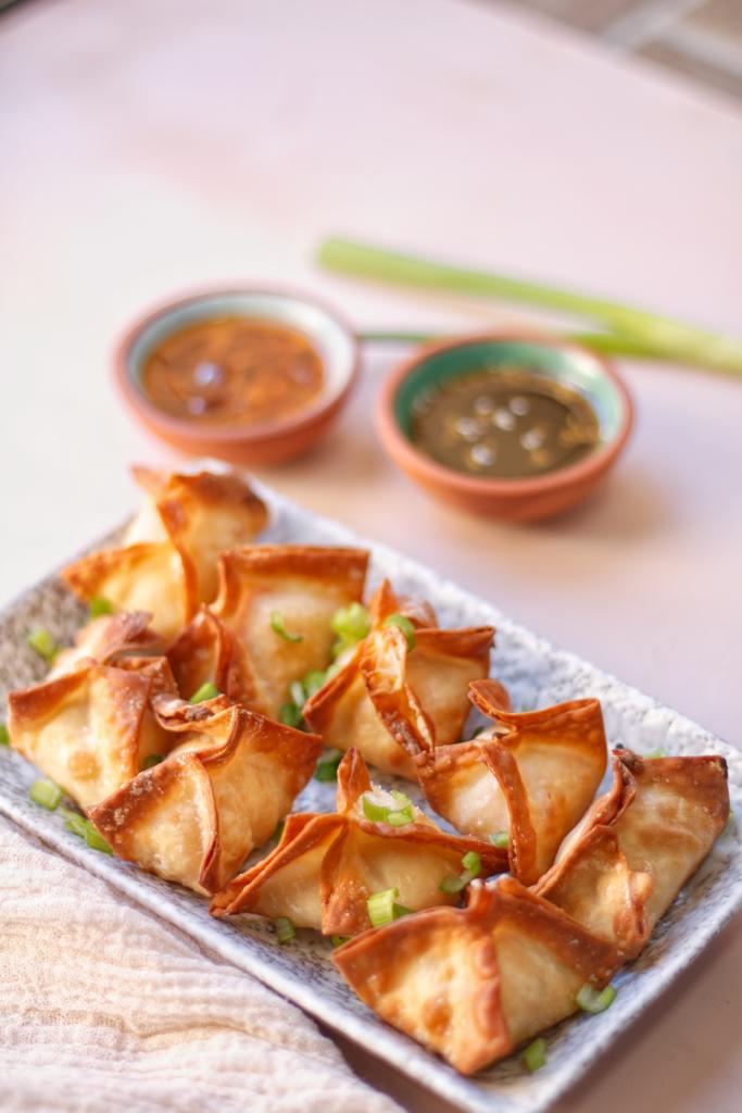 These Crispy Air Fryer Crab Rangoons are stuffed with cream cheese and imitation crab meat. They are super crunchy, delicious, and easy to make at home.