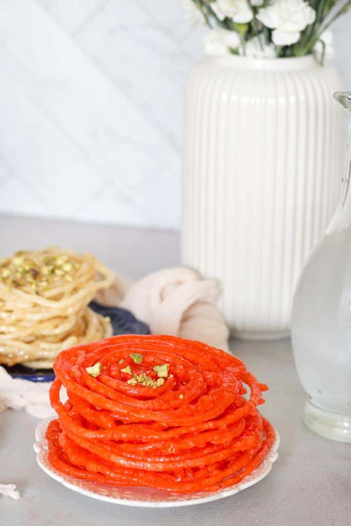 This is a delicious Iraqi sweet treat full of crispiness and bright colors.