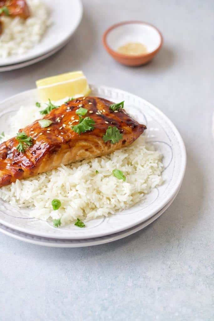 air fry salmon fillets then serve them on a hot bed of rice garnished with sesame seeds and finely chopped fresh parsley