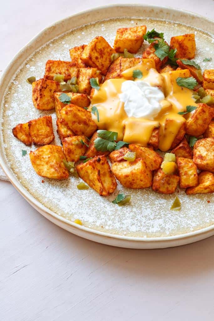 These homemade and delicious air fried  potato cubes are crispy and spicy.