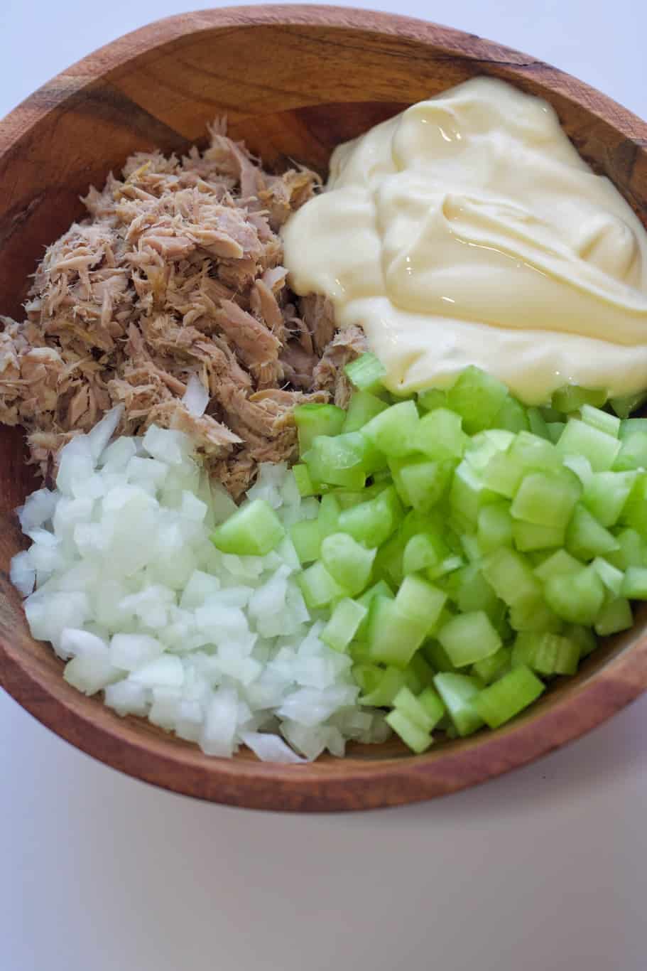 copycat jimmy john's tuna recipe ingredients: celery, onions, tuna, and mayo