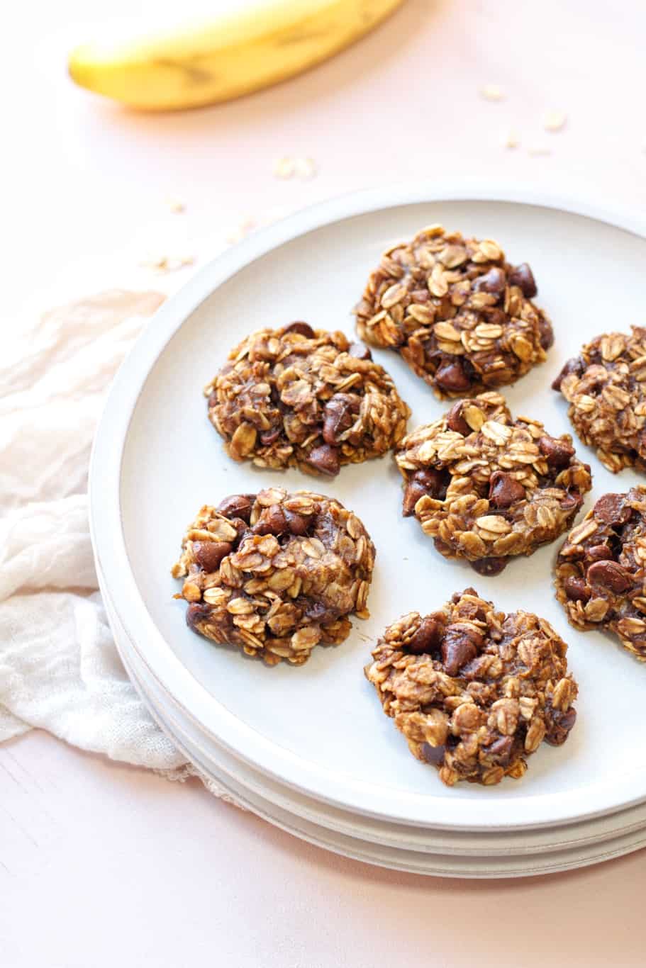 These healthy banana oatmeal cookies are best served warm as a quick breakfast or healthy snack. Stacked on a plate for the family to enjoy! 