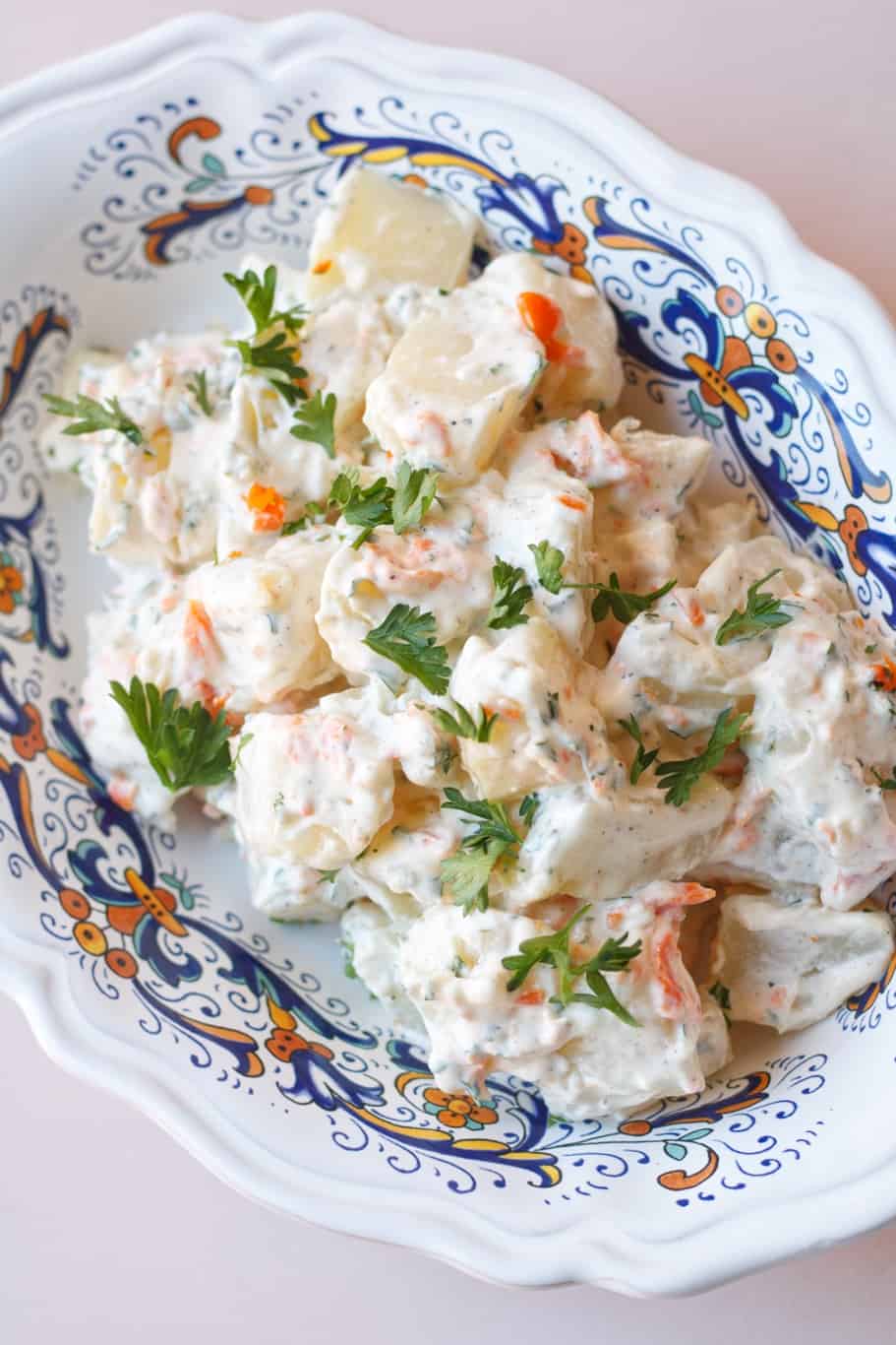 refreshing juan pollo salad with finely chopped fresh parsley on the top