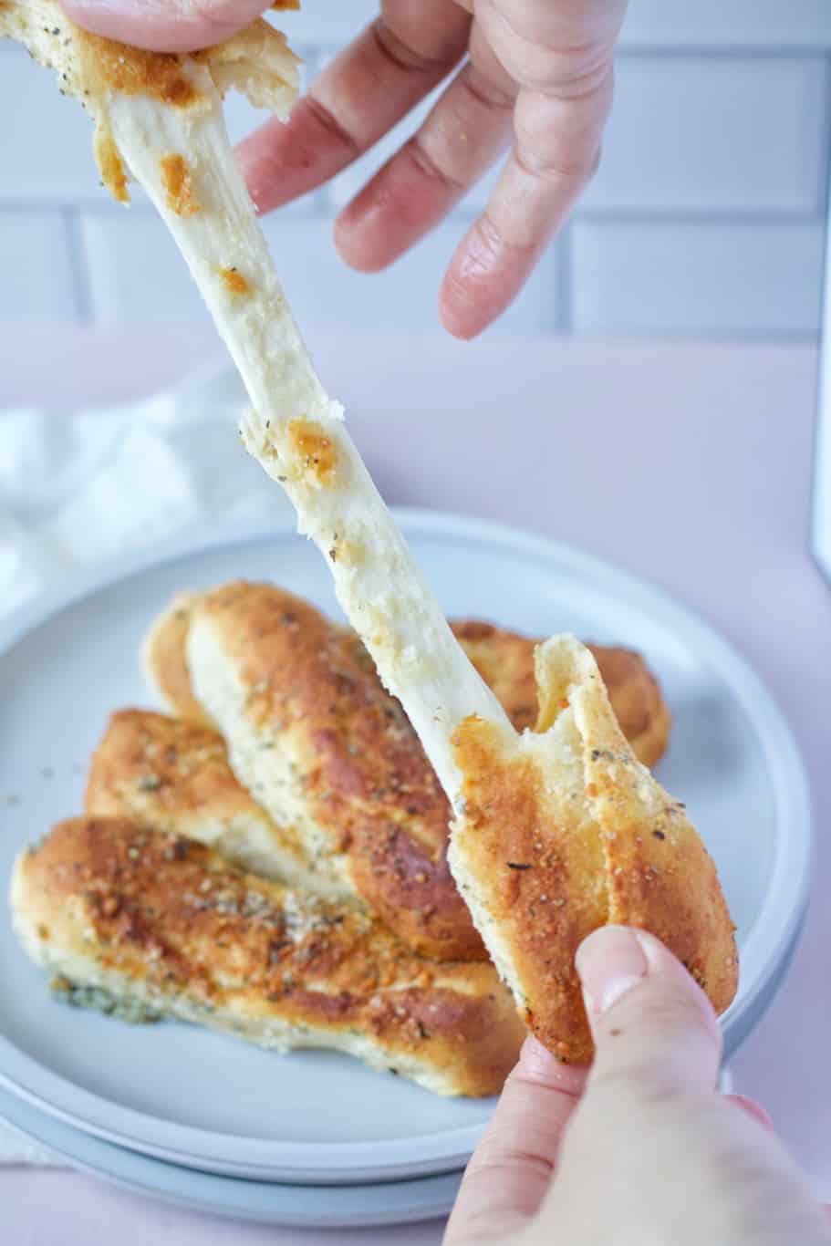 Soft, buttery crescent rolls brushed with a garlic and herb butter, baked with gooey mozzarella cheese, and topped with another brush of the garlic butter!