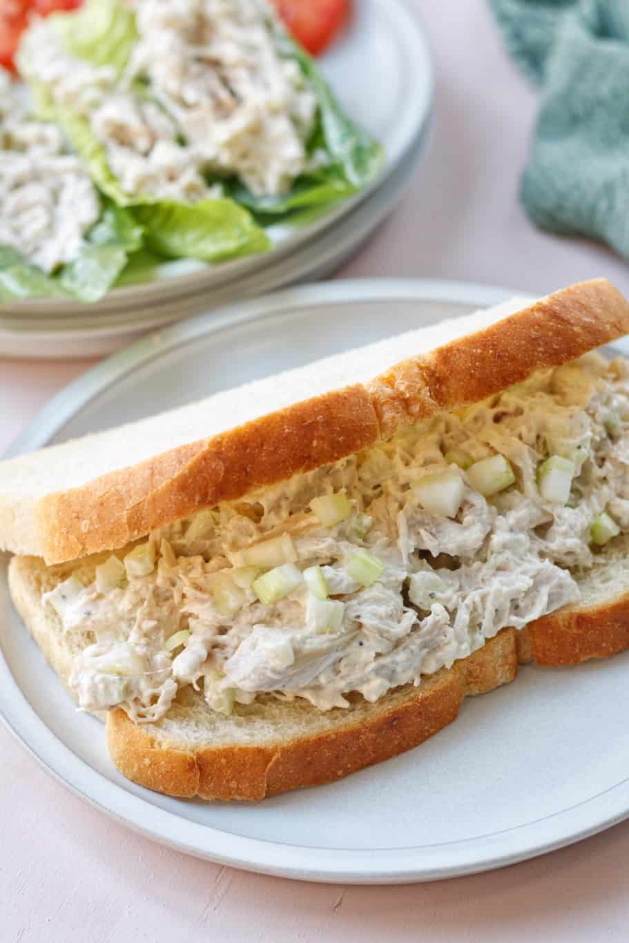 creamy zoe's chicken and celery salad served as sandwich on sourdough bread 