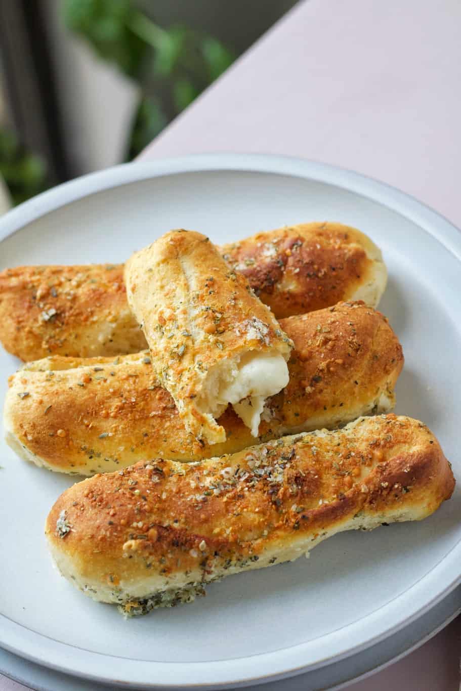 Pillsbury crescent rolls brushed with garlic butter and wrapped around mozzarella cheese.