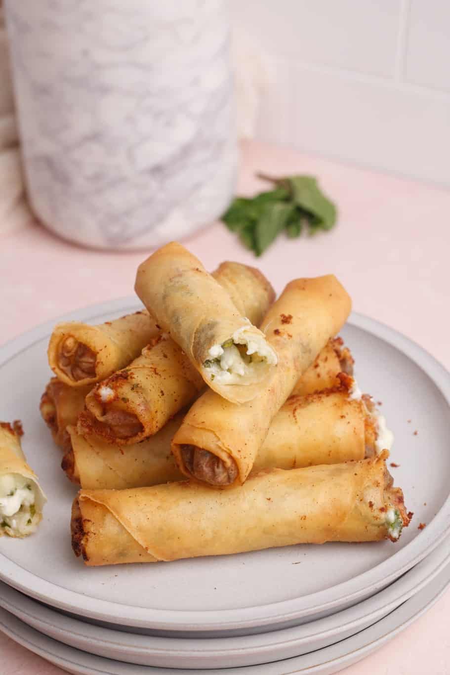 Turkish cheese rolls stuffed with a combination of feta cheese,, mozzarella cheese, and fresh herbs