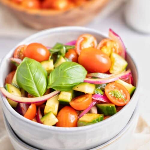 a small bowl of refreshing Panera basil cucumber salad ready to be served